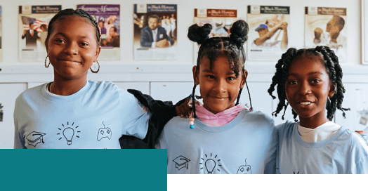3 students smiling